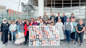 A photograph of Stop the Rwanda plan protesters outside the Welsh Senedd.