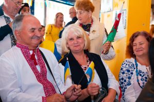 Smiling people at Ukrainian Independence Day celebrations.