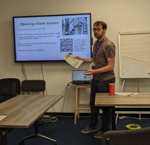 Housing research and Policy Lead Gareth delivers workshop to promote financial well-being for sanctuary seekers and refugees.