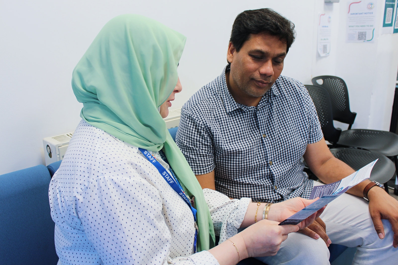 Media – 2025-07-11T141206.857 Two staff members at the Welsh Refugee Council talking about current services.