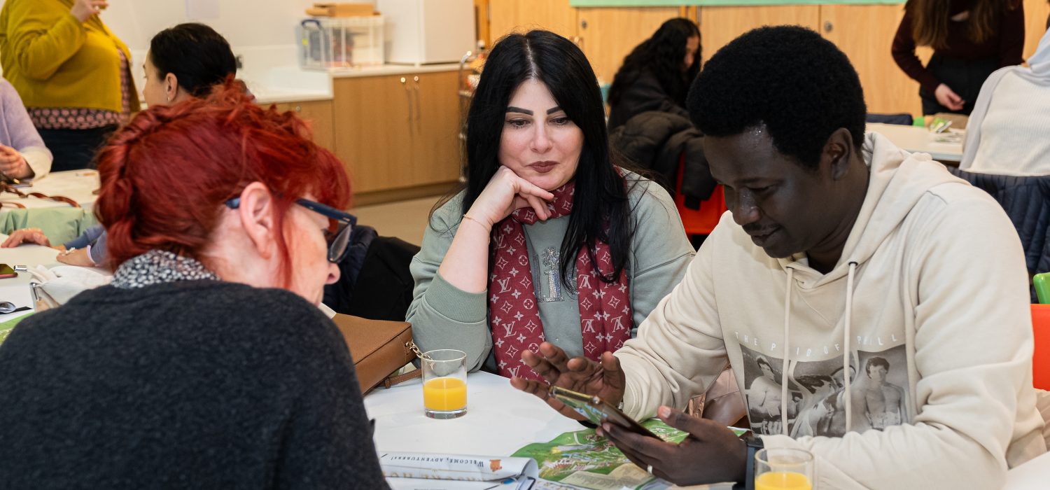 Welsh Refugee Council team working together.