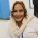 Smiling female caseworker at the Welsh Refugee Council.