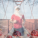 Man dressed like Santa on a run.