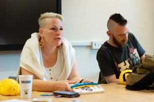 Woman leads a craft workshop with the Welsh Refugee Council.