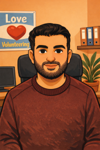 Cartoon image of a man sat at a desk in the Welsh Refugee Council office. Behind him is a poster that reads 'love volunteering'.