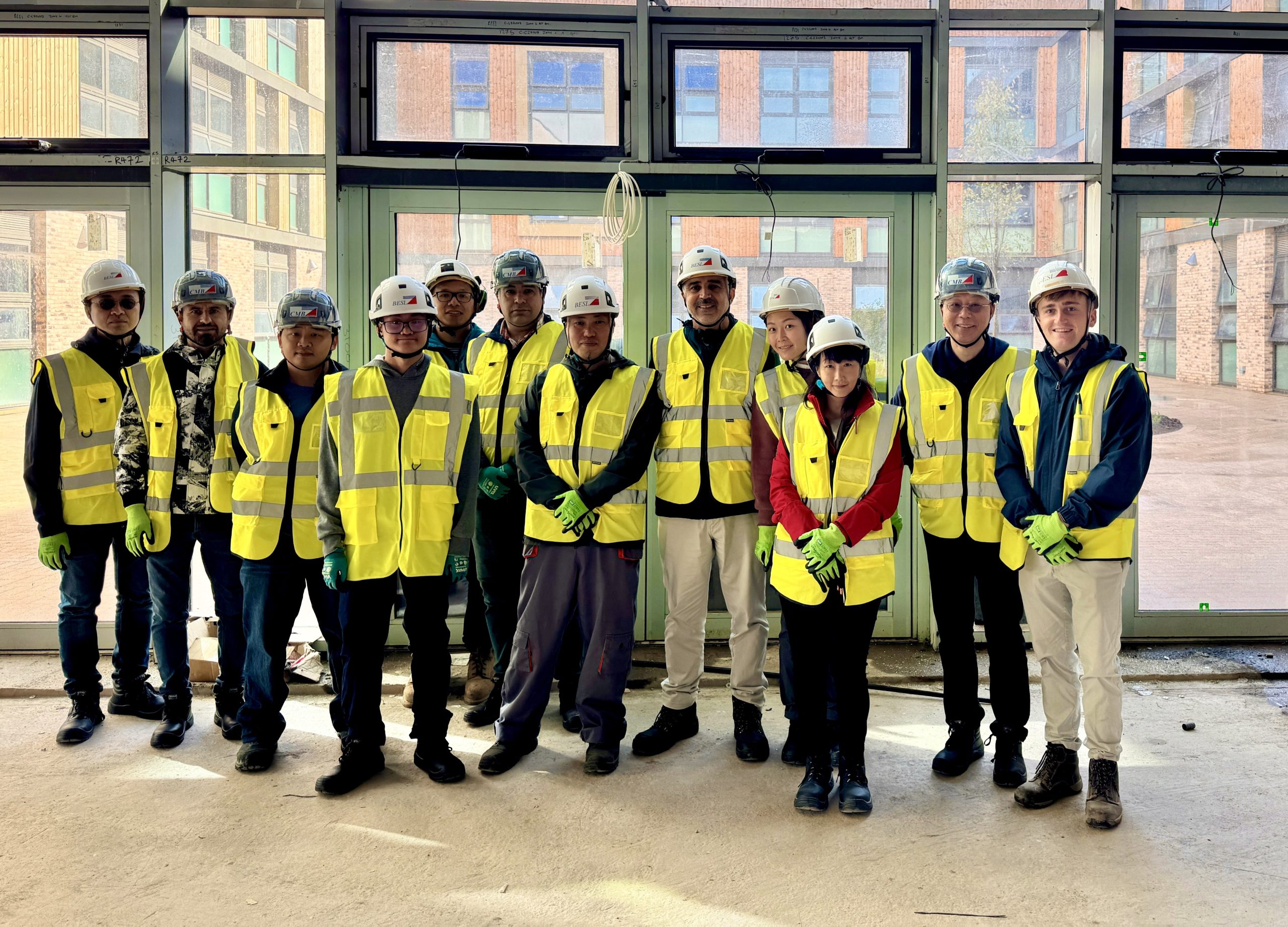 Education and employability team on a site visit wearing protective equipment.