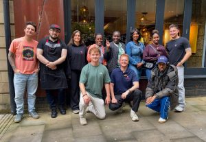 Group from Welsh Refugee Council outside Nandos. 