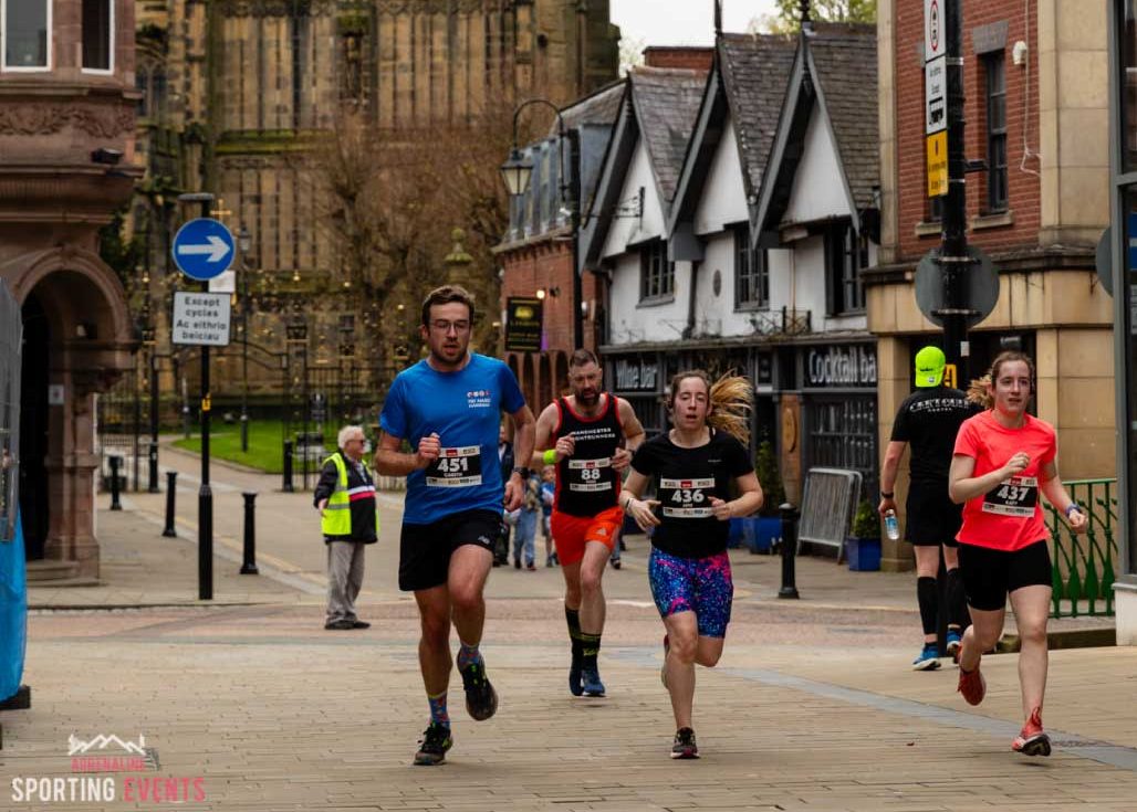 Runners in the Wrexham 10k run through town centre